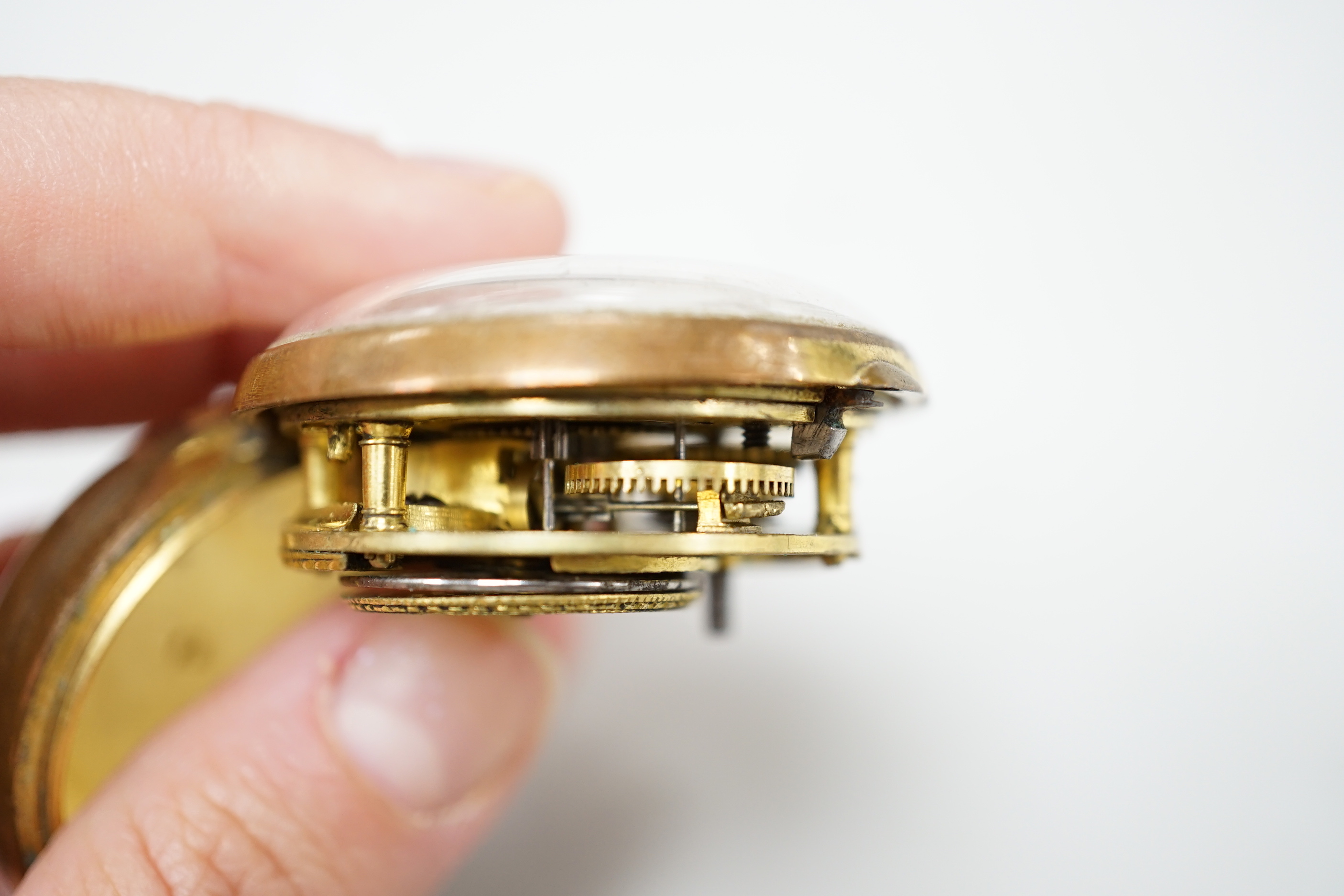 An 18th century gilt metal pair cased keywind verge pocket watch, by William Hope, London, with Roman dial, the signed movement numbered 1523.